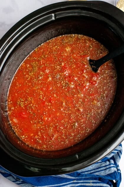 Bubbling tomato sauce in a crockpot.