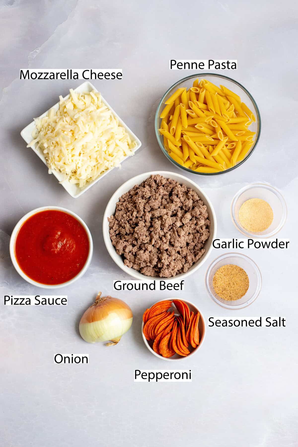 Ingredients for pizza pasta casserole.