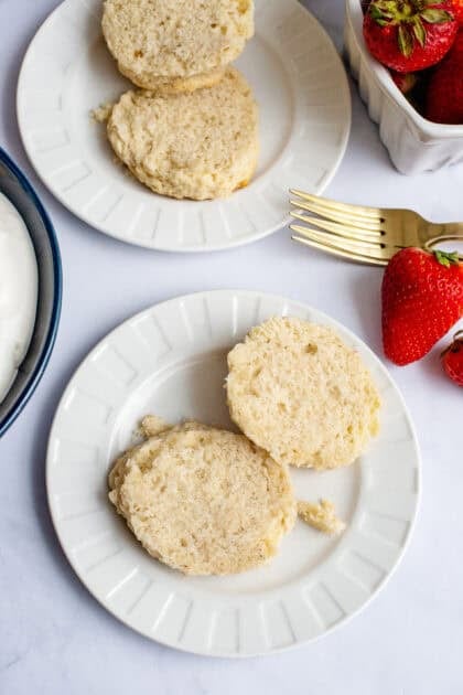 An opened biscuit on a white plate.