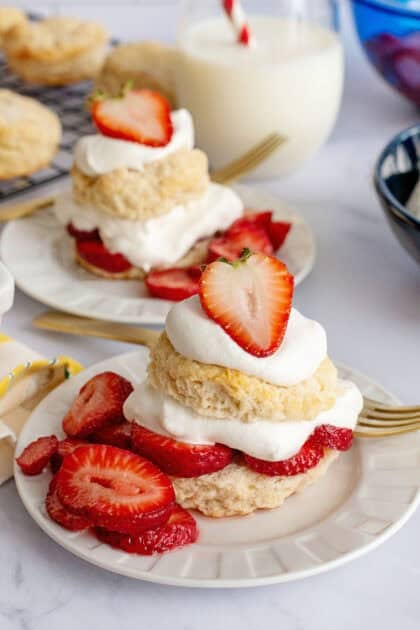 Delicious Southern strawberry shortcake with whipped cream and biscuits.