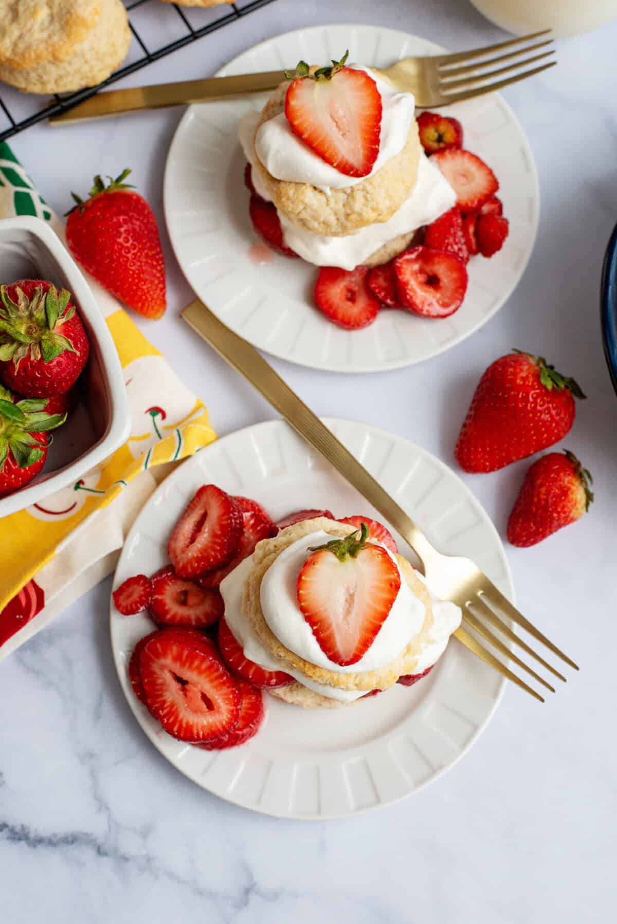 Aerial view of Southern strawberry shortcake with whipped cream and biscuits.