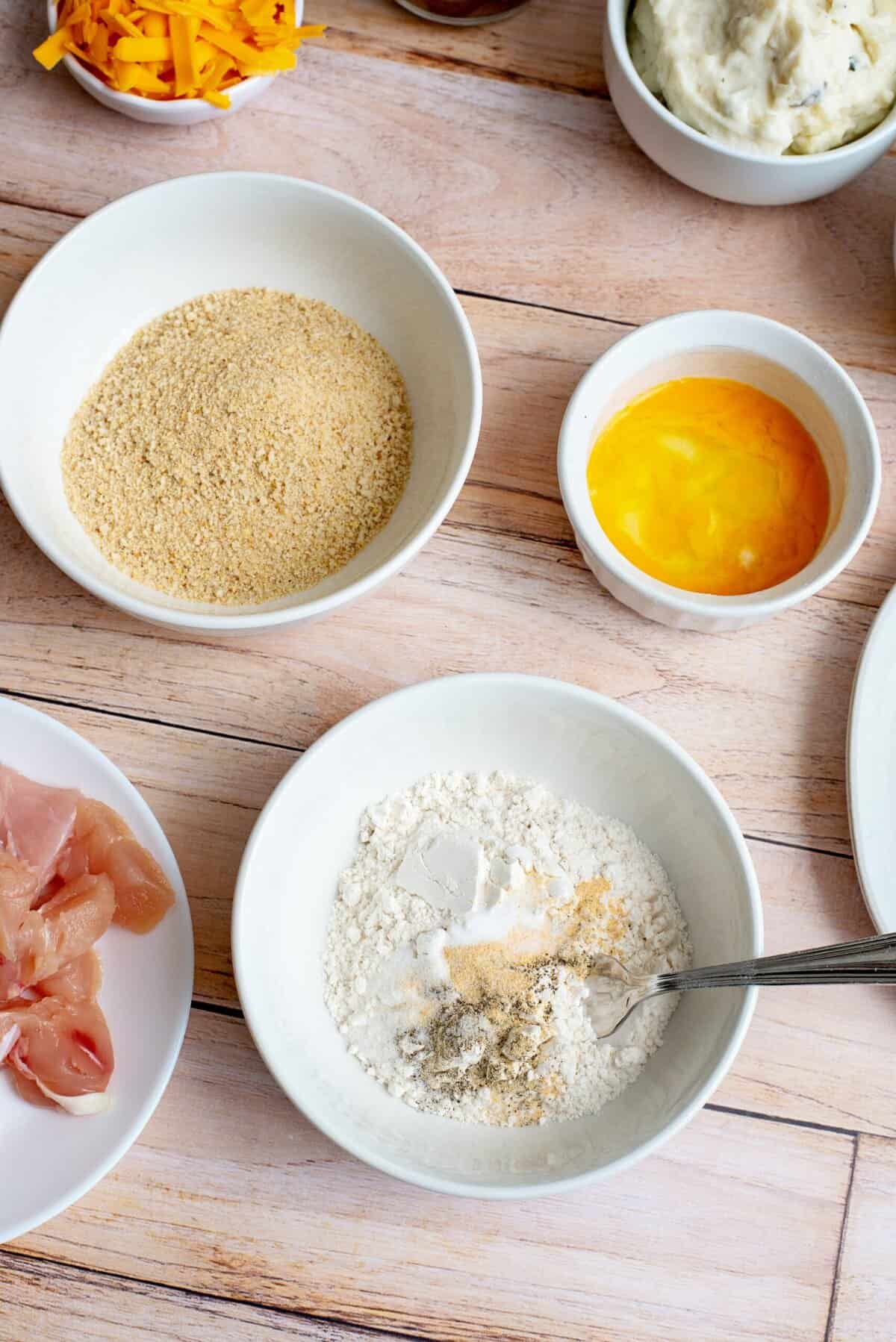 Mixing the breading for homemade KFC bowls.