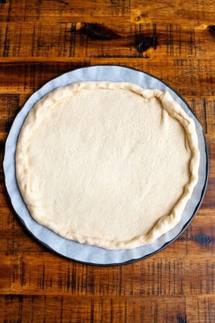 Rolled out crescent roll dough made into a pizza crust.
