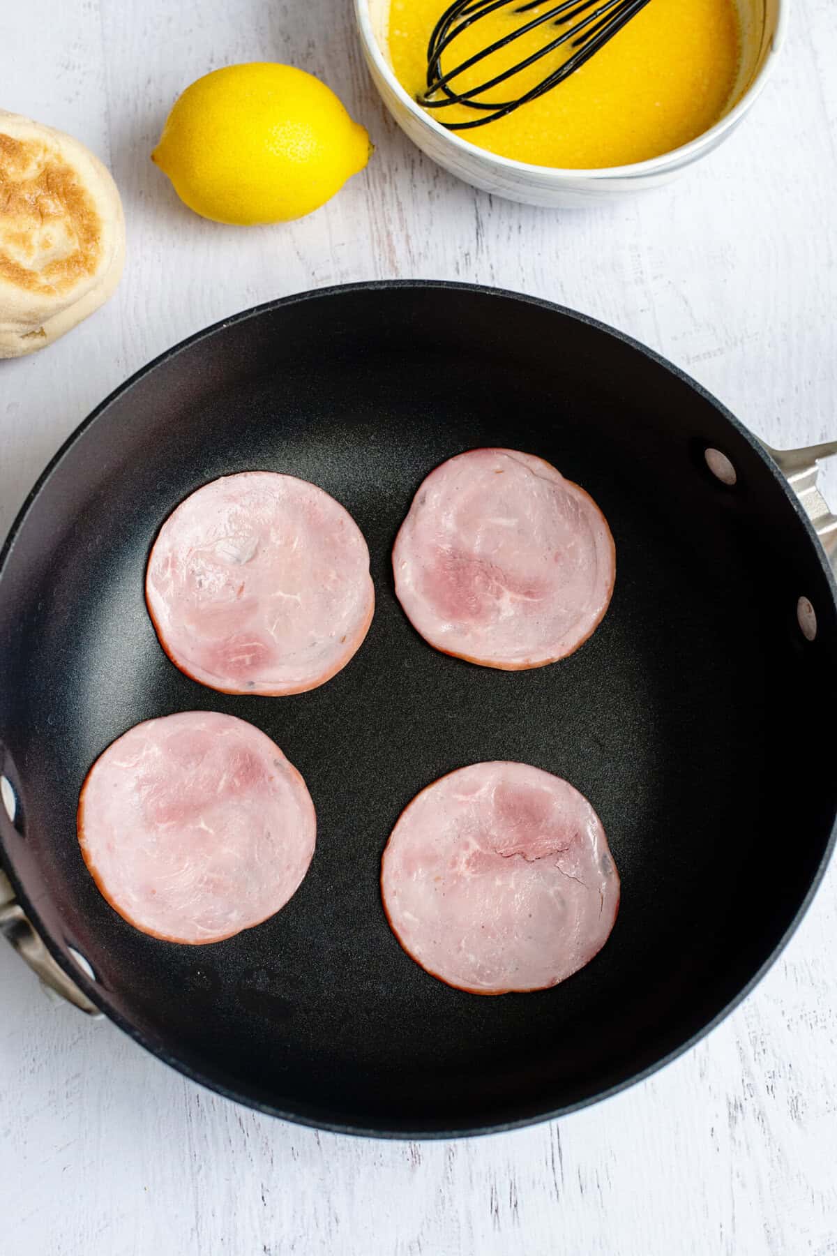 A pan with slices of Canadian bacon