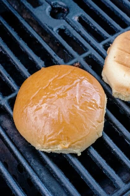 Burger top bun on the grill