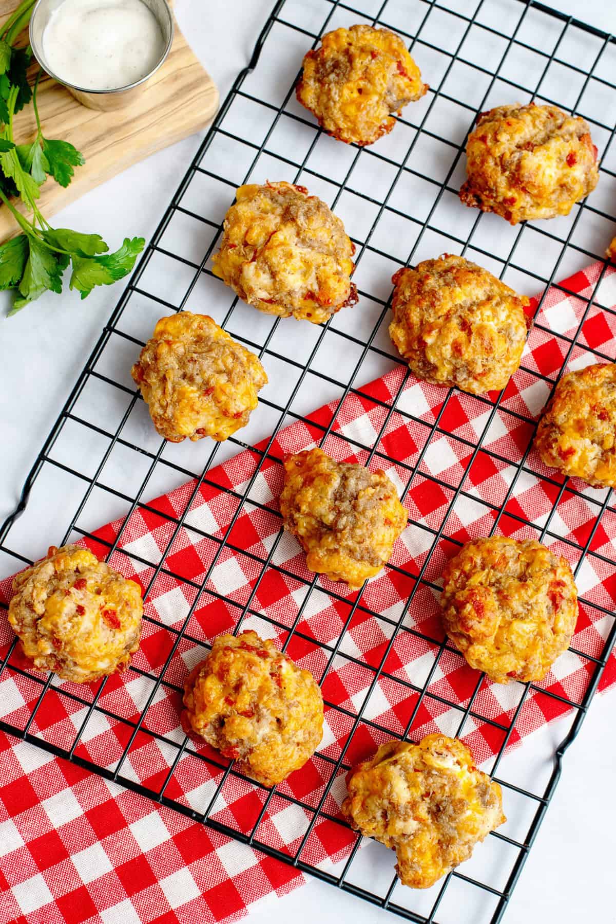 Baked Rotel cream cheese sausage balls on a cooling rack