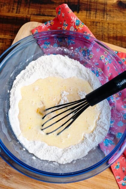 Whisking the apple skillet cake batter