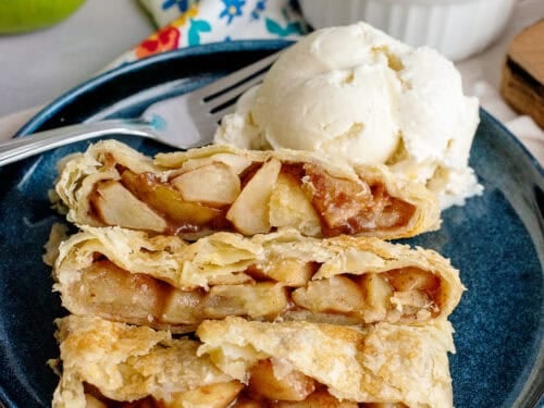 Apple strudel on a plate with ice cream