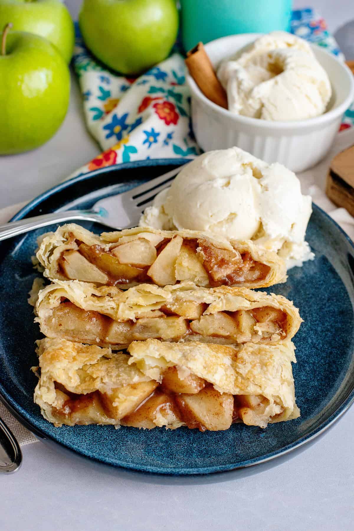 Apple strudel on a plate with ice cream