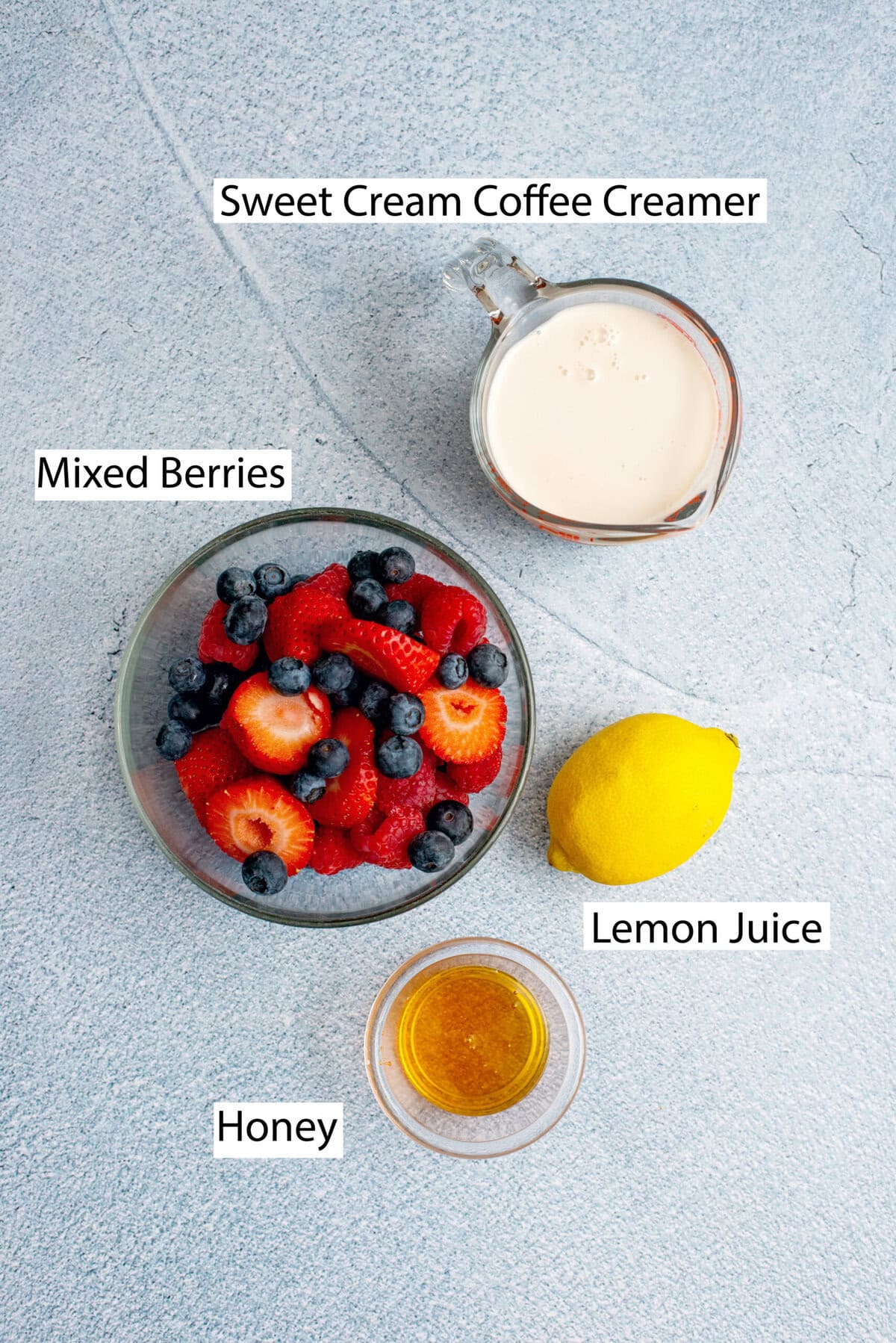 Ingredients for berries and cream popsicles