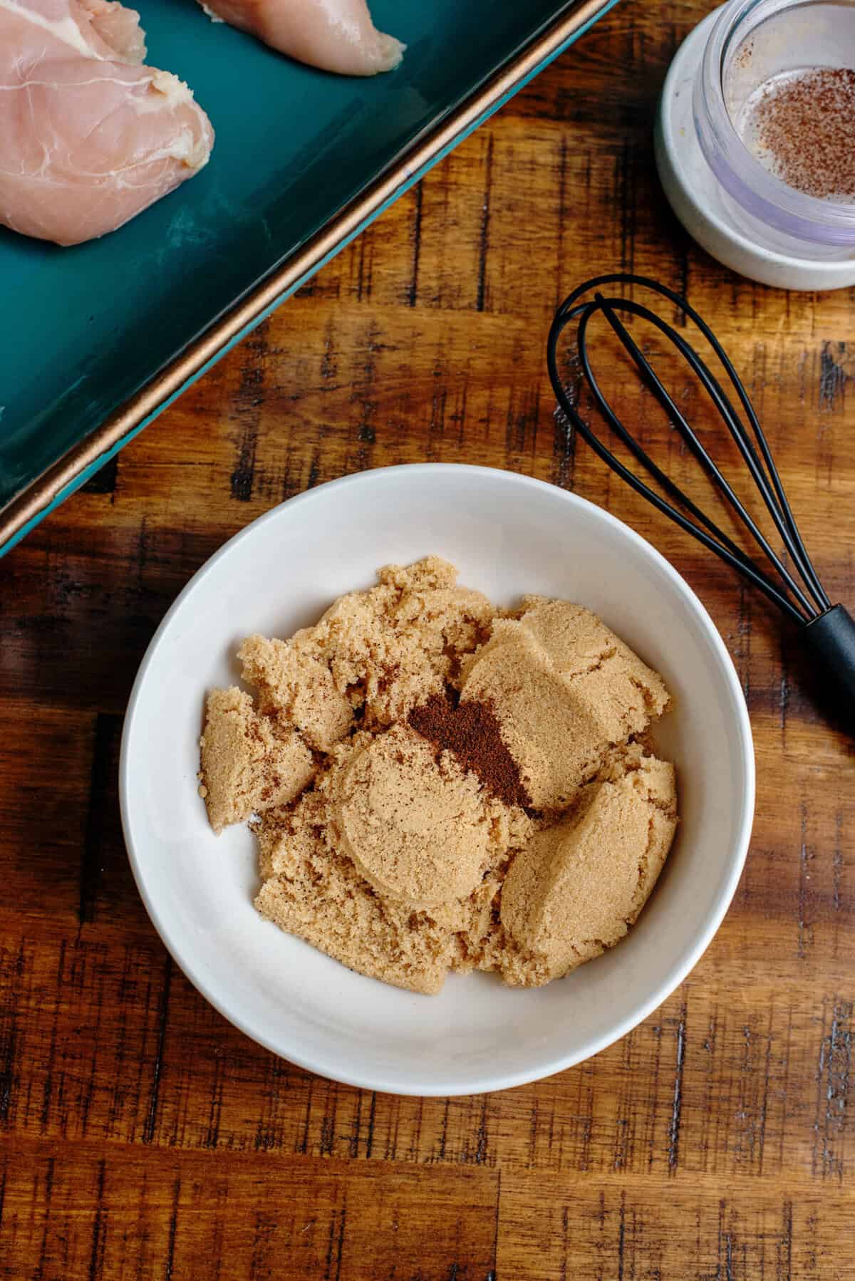 A bowl of ingredients used for the ginger peach chicken mix