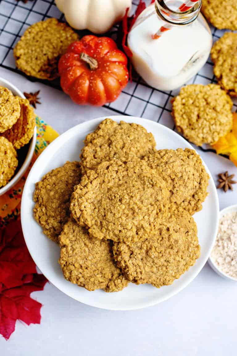 a plate of pumpkin spice oatmeal cookies