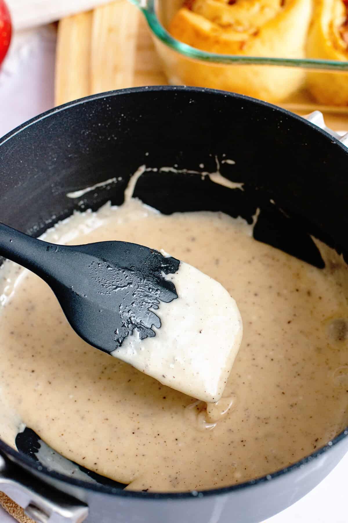A saucepan of brown butter maple icing