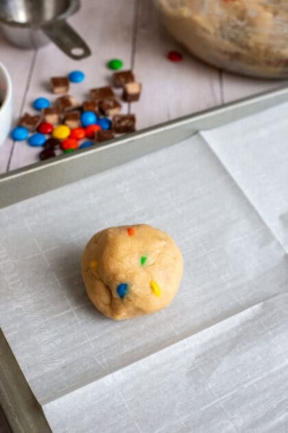 A shaped ball of Halloween Candy Cookie batter