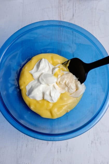 A bowl of cream of chicken soup, sour cream, and mayonnaise