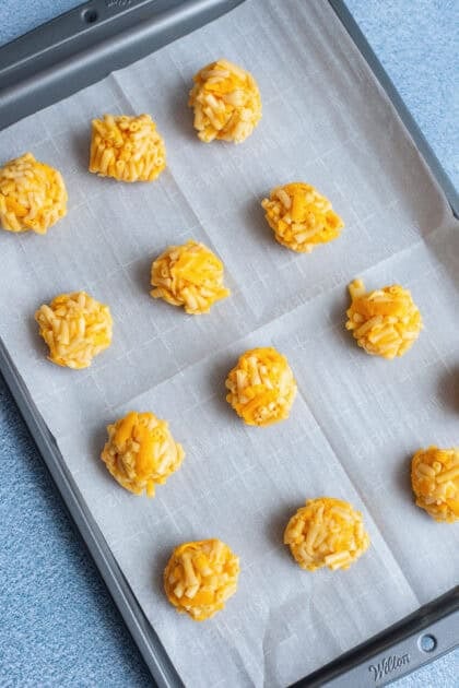 A tray of mac and cheese balls ready for chilling