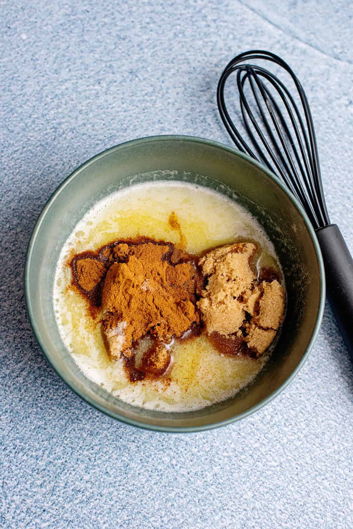 A bowl of butter mixture for the fall snack mix