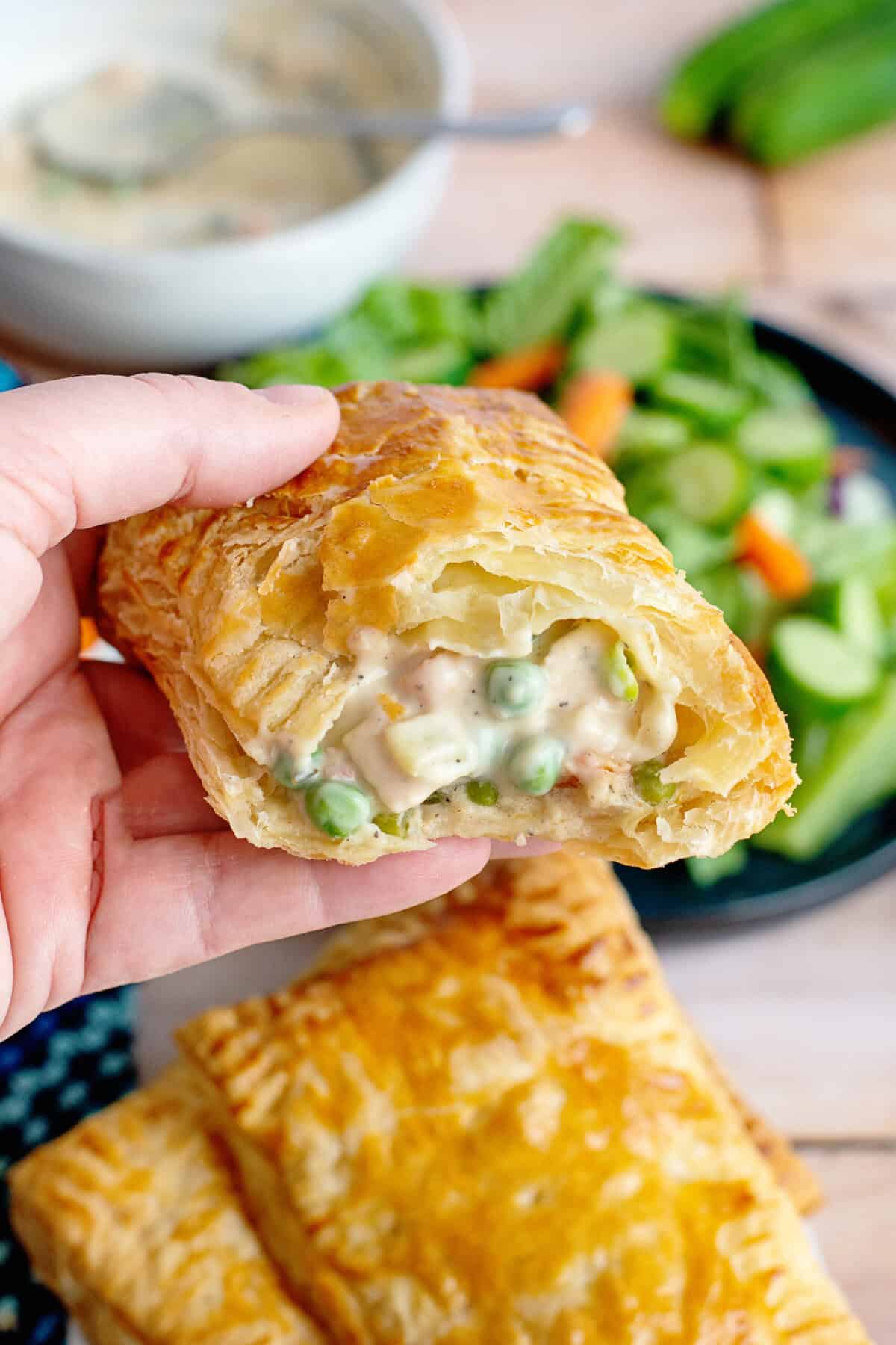 Holding a handheld chicken pot pie