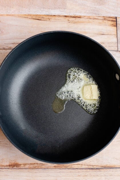 Melting butter in a large skillet