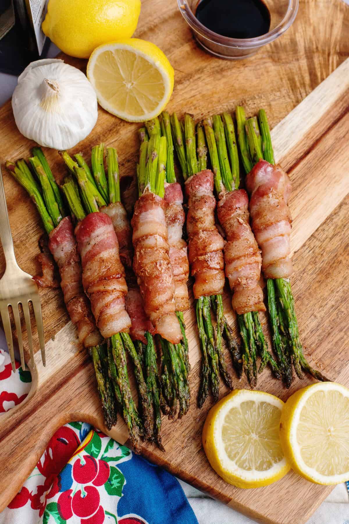 Bacon-Wrapped Asparagus on board (close up)