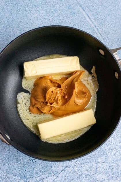Saucepan with butter and creamy peanut butter