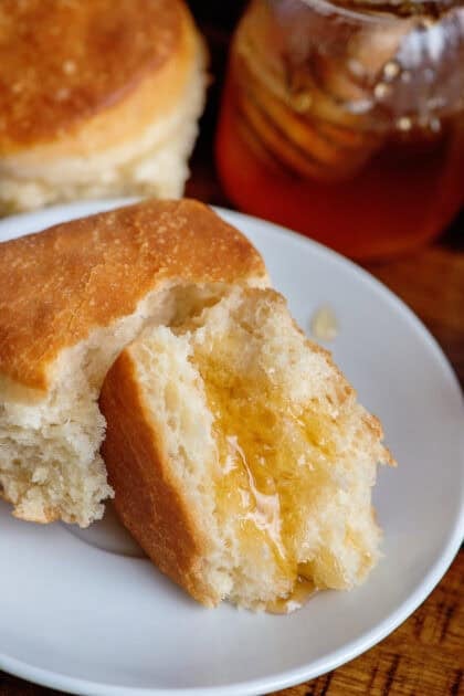 Homemade dinner rolls with honey