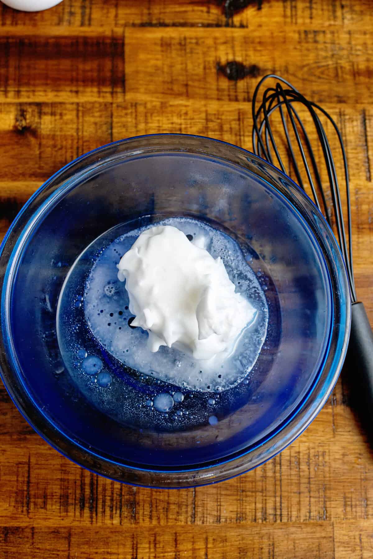 A bowl of dinner roll shortening with boiling water poured over it