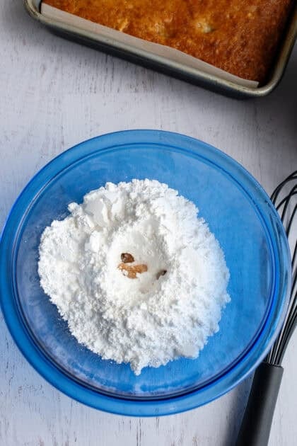 Dry ingredients for the brown butter frosting in a bowl