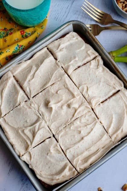 Sliced banana bread cake bars with brown butter frosting