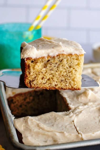 Taking a banana bread cake bar from the pan