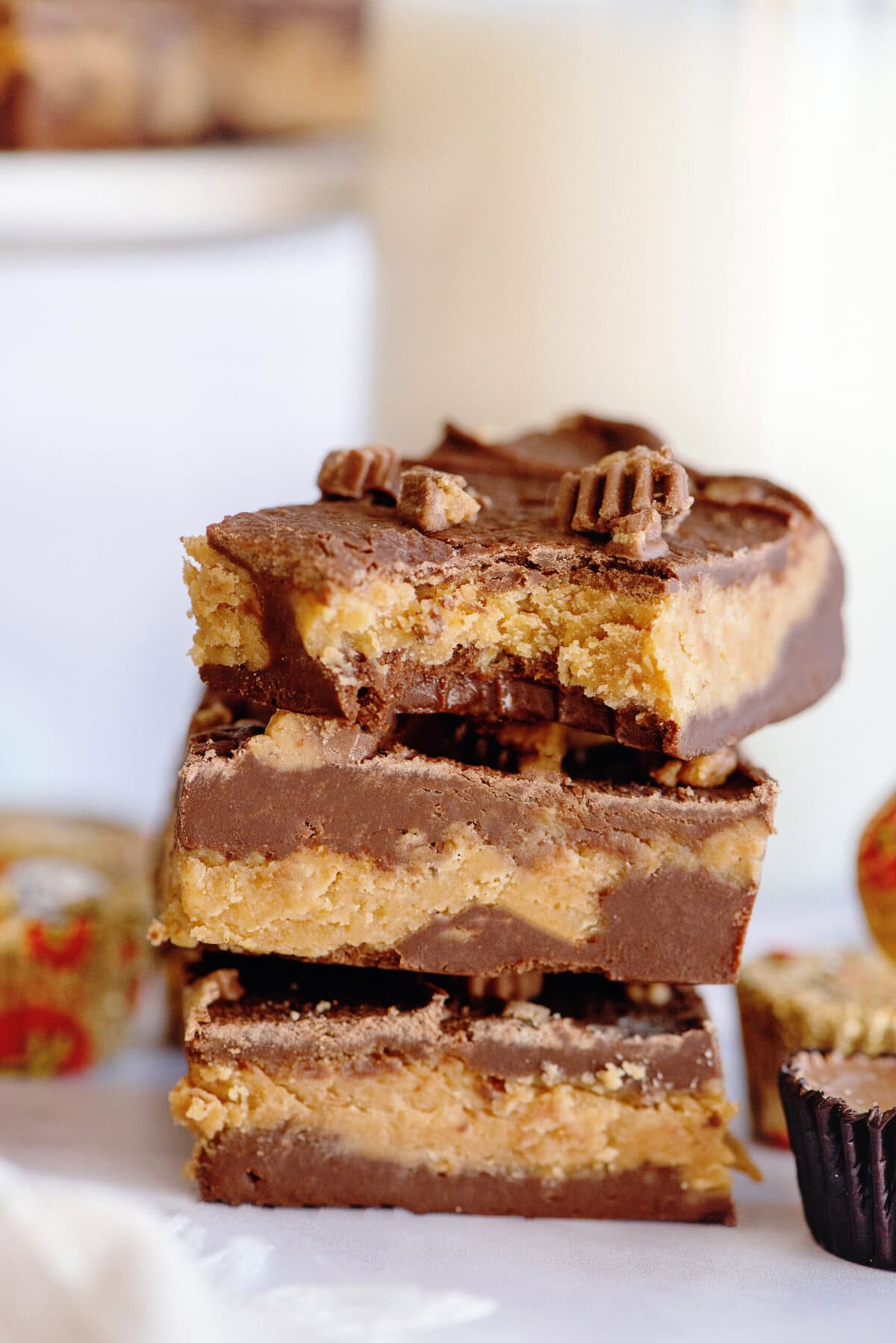 A stack of chocolate peanut butter fudge squares