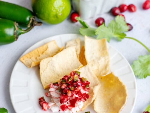 Cranberry Jalapeño Cream Cheese Dip on a chip