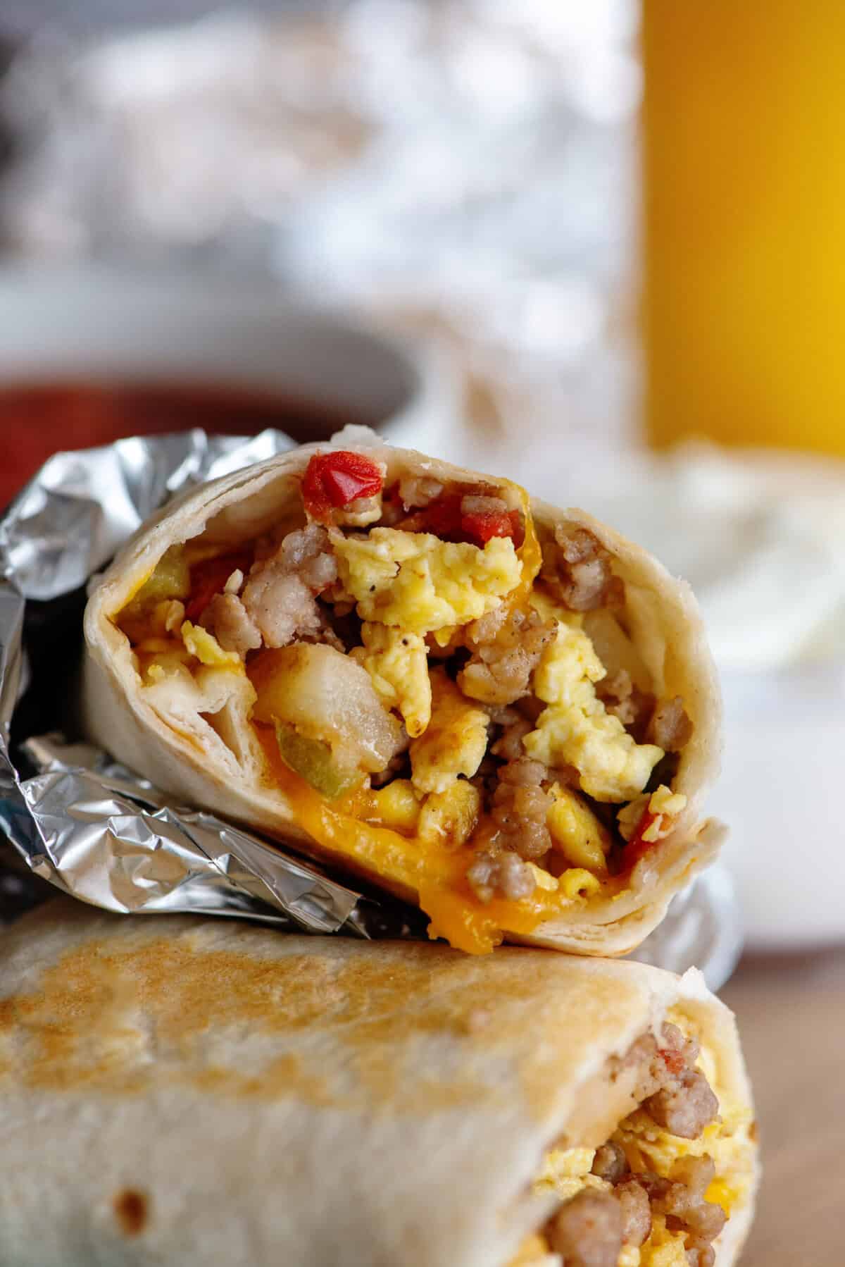 Close up of a grab and go breakfast burrito wrapped in foil