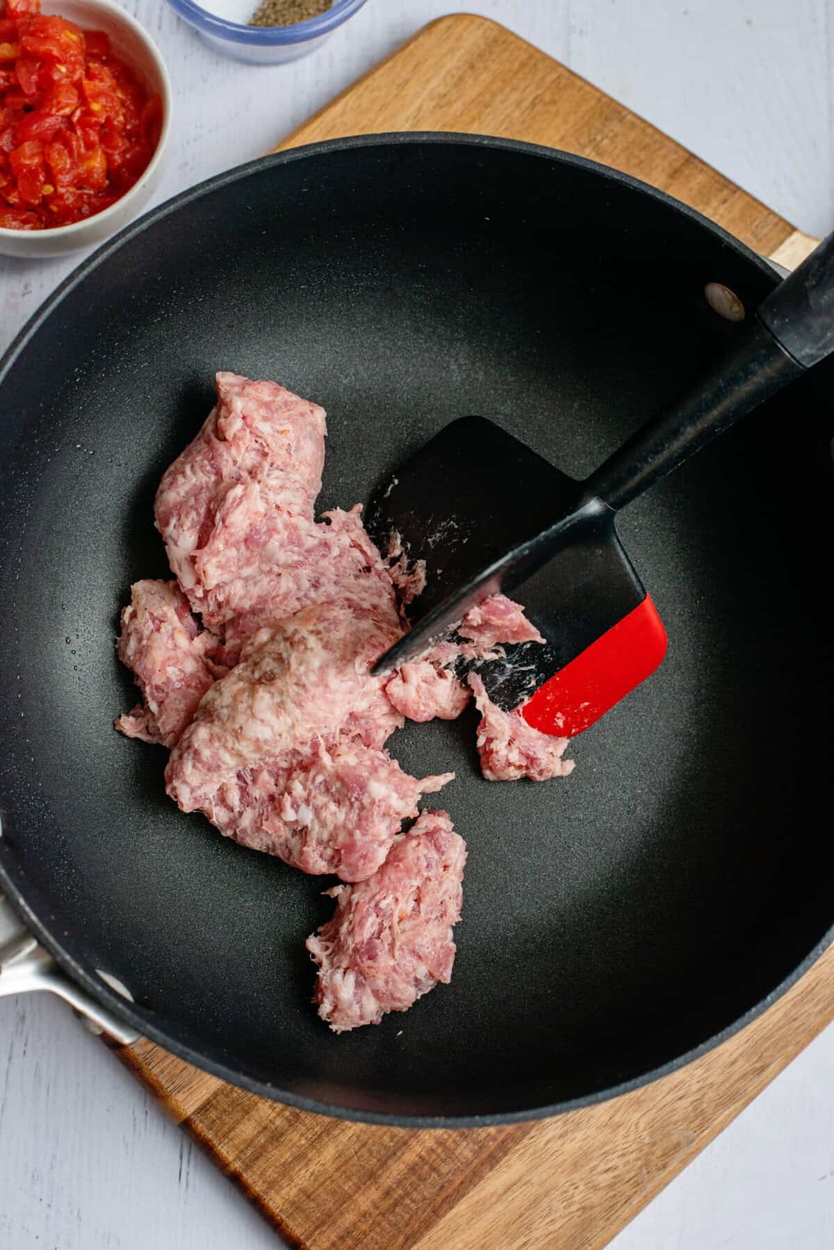 Cooking sausage for the breakfast burritos in a skillet