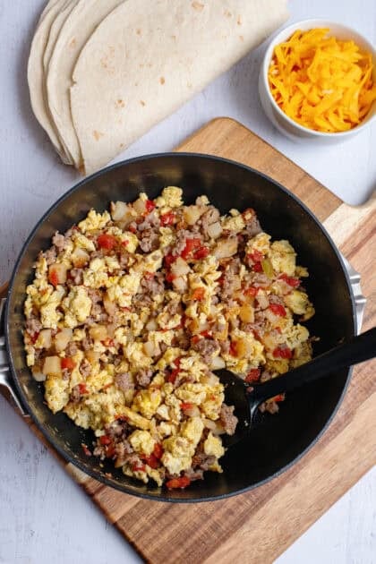 Breakfast burrito filling scrambled in a skillet
