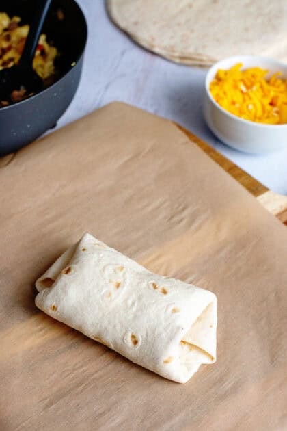 A rolled grab and go breakfast burrito