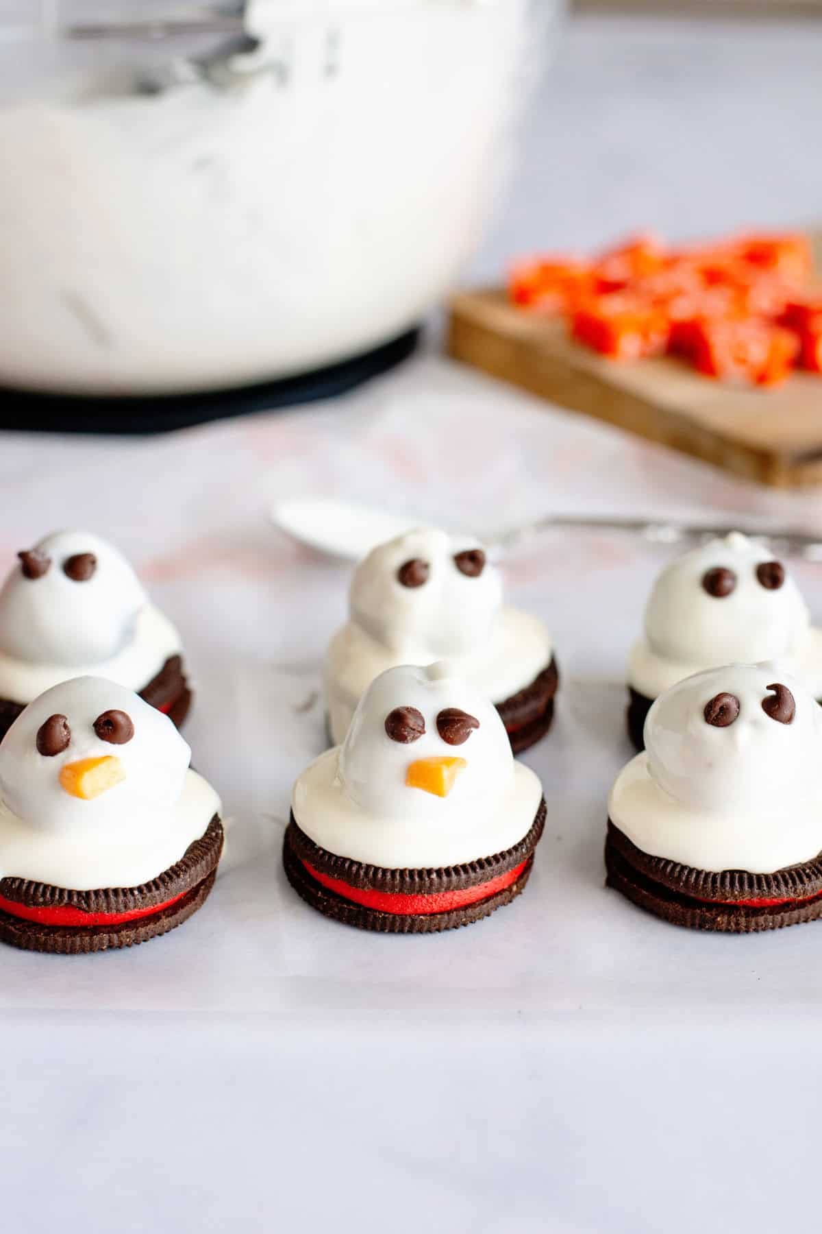 A line of snowman Oreo balls