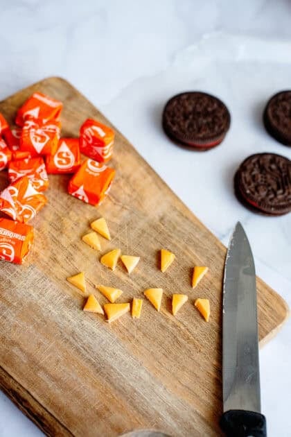 Starburst candies cut into triangles for the snowman cookie balls decorations