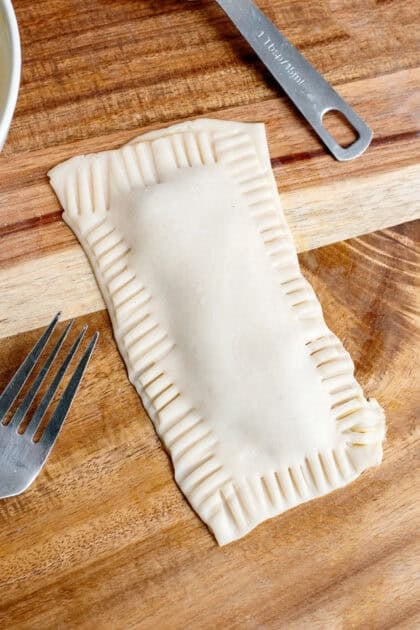 A sealed homemade strawberry pop-tart ready to bake