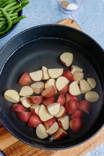 Boiling new potatoes in a pot