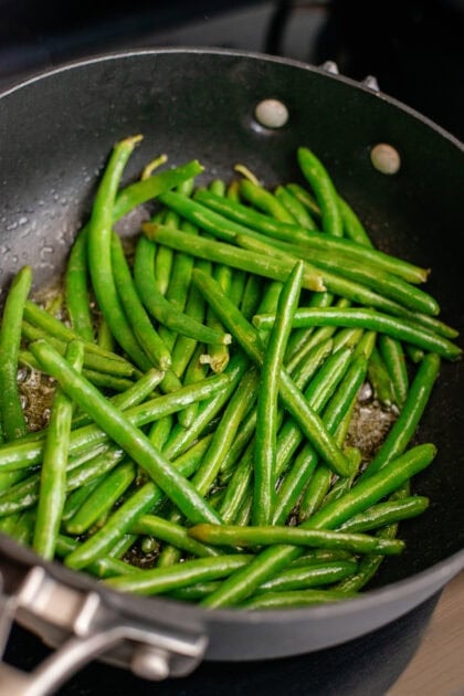 Browned green beans in pan