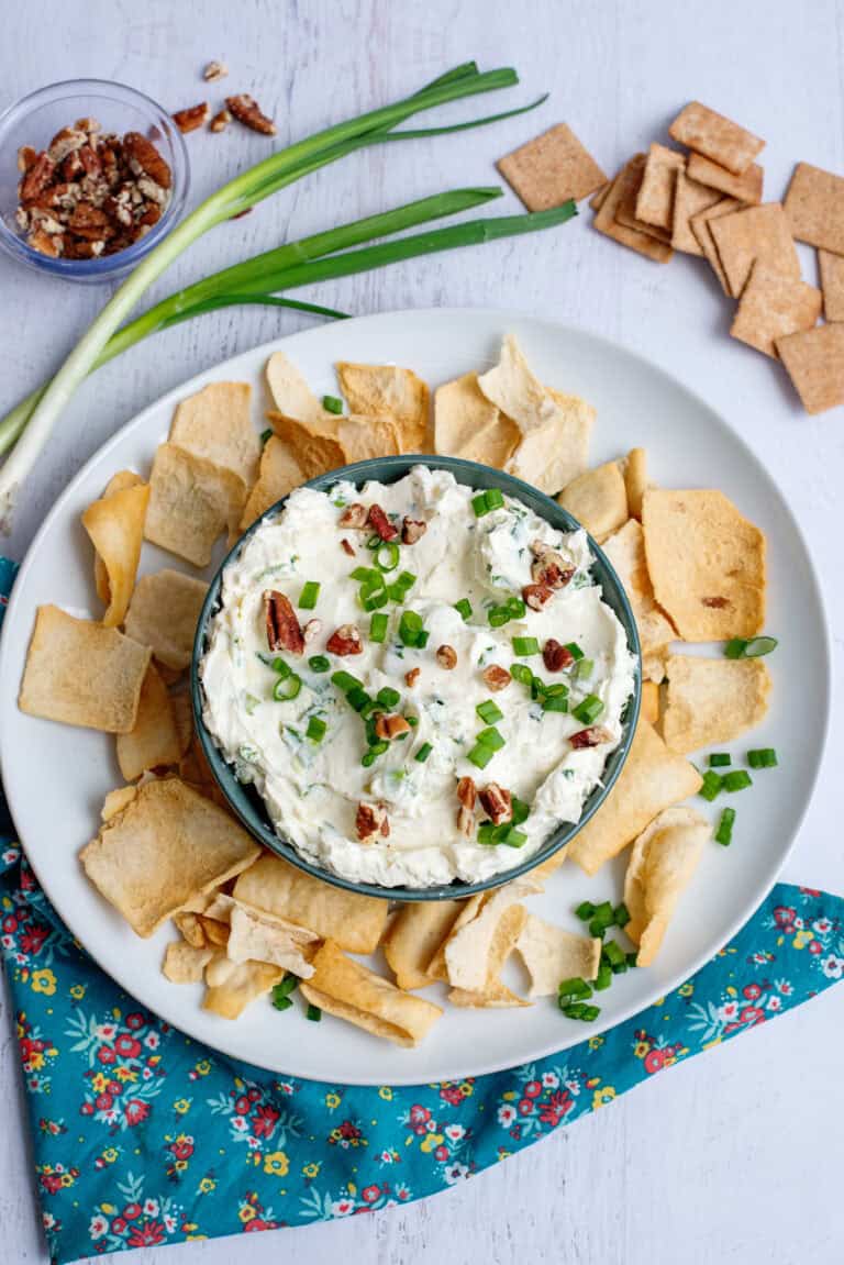 A plate of green onion cheese ball/dip