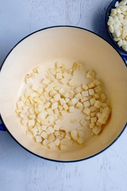 Adding hash browns to dutch oven