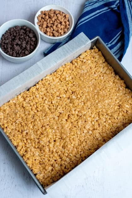 Crisp rice cereal mix evenly spread in a pan
