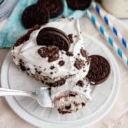 a plate with a slice of Oreo Cheesecake Pie