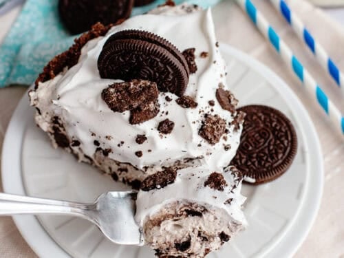 a plate with a slice of Oreo Cheesecake Pie