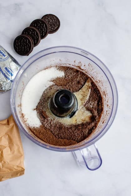 crushed chocolate crackers with butter and sugar in a food processor