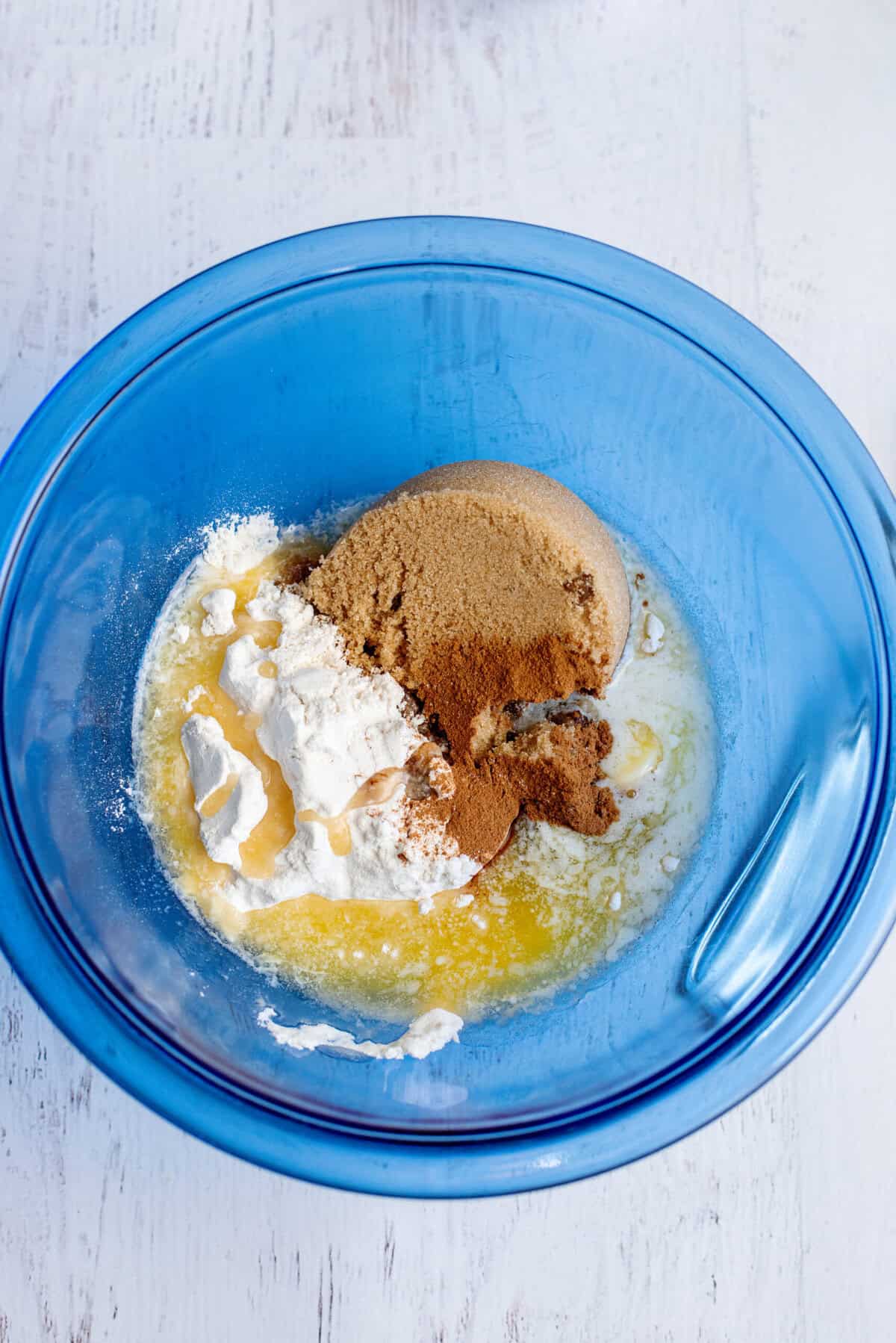 A small bowl with brown sugar, flour, cinnamon, and melted butter