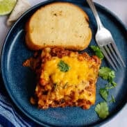 A serving of Tex Mex lasagna with some Texas toast