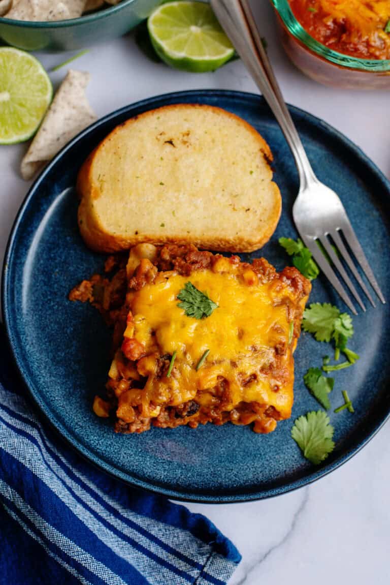 A serving of Tex Mex lasagna with some Texas toast